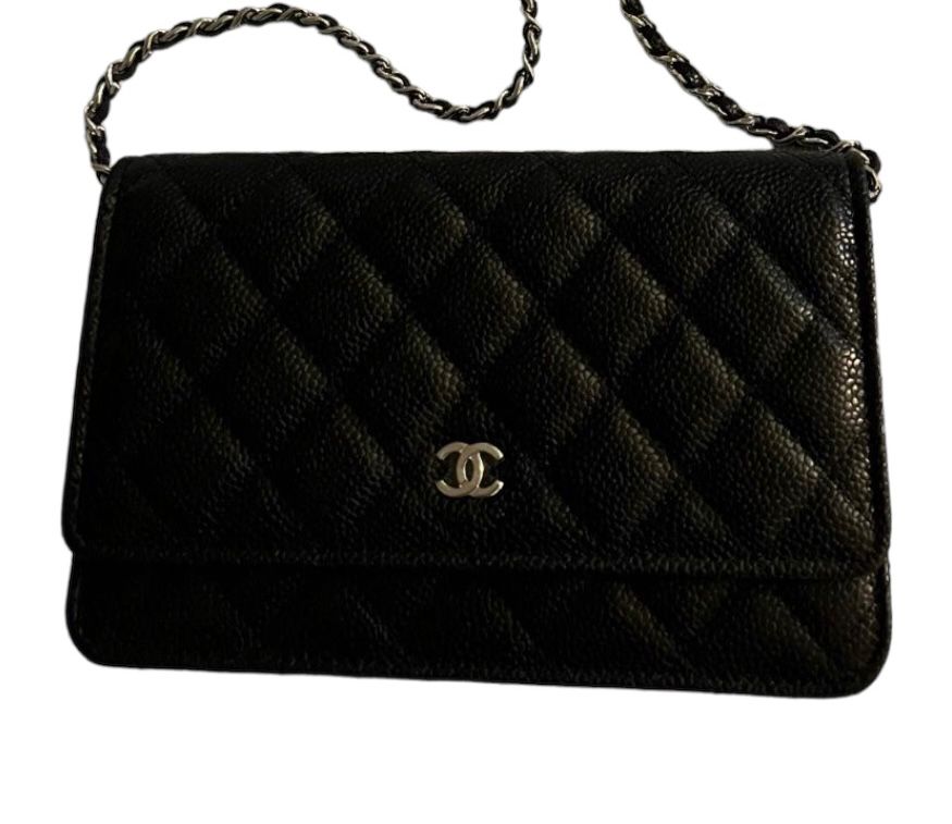 Chanel WOC Wallet On Chain Classic. Wymiary; 17.8 cm x 12.7 cm x 5.1 cm Czarna skóra caviar srebrne okucia. Nowa z kompletem z butiku Chanel